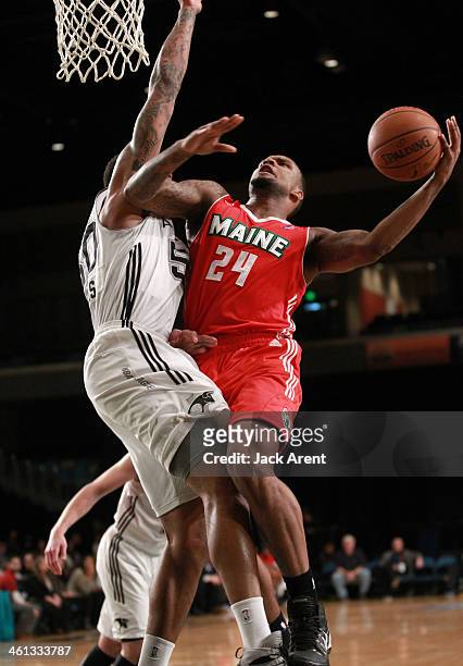 Romero Osby of the Maine Red Claws shoots the ball against the Austin Toros during the 2014 NBA D-League Showcase presented by Samsung Galaxy on...