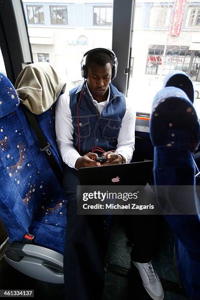 Aldon Smith of the San Francisco 49ers relaxes on the bus on the way Lambeau Field prior to the game against the Green Bay Packers on January 5, 2014...