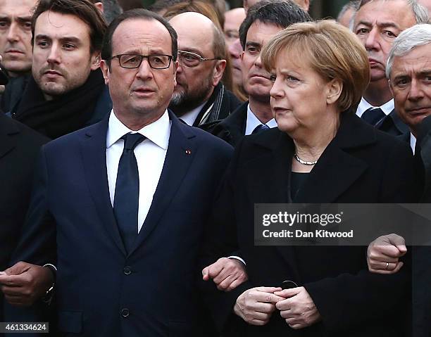 World leaders and dignitaries, including French President Francois Hollande, French Prime Minister Manuel Valls and German Chancellor Angela Merkel...