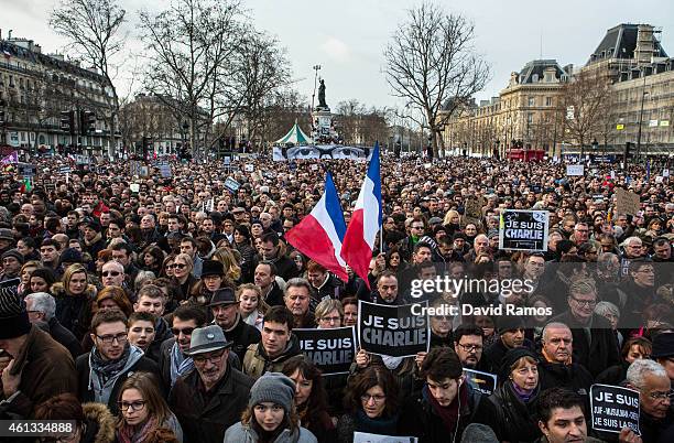 Demonstrators make their way along Place de la Republique during a mass unity rally following the recent terrorist attacks on January 11, 2015 in...