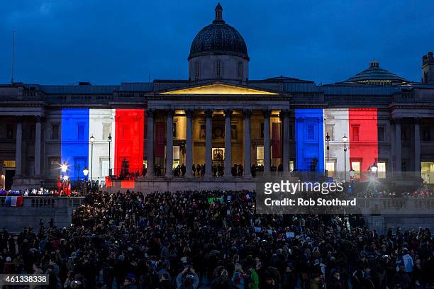 The National Gallery is lit in the blue, white and red colours of the national flag of France in tribute to the victims of the terrorist attacks in...