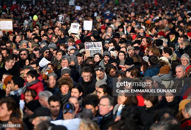 Some 20,000 people march on January 11, 2015 in Brussels in tribute to the 17 victims of the three-day killing spree in France that ended on January...