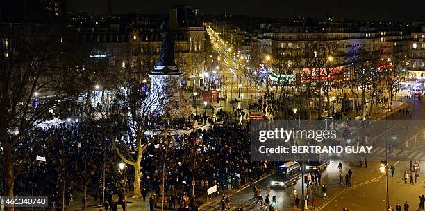 People take part in a Unity rally Marche Republicaine on January 11, 2015 on the Place de la Republique in Paris in tribute to the 17 victims of a...