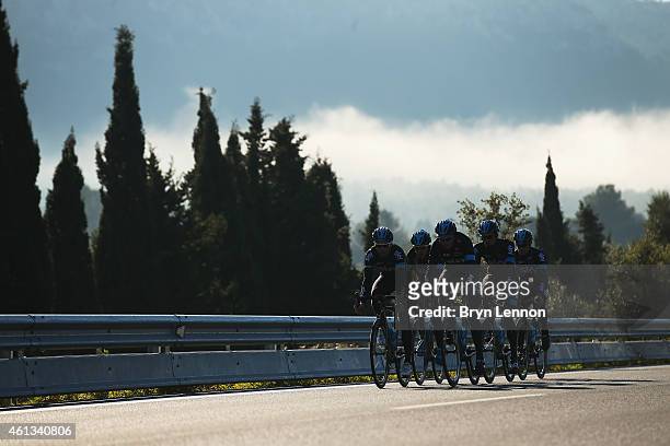 Chris Froome of Great Britain and team mate Philip Deignan of Ireland lead a group of Team SKY riders during a Team SKY Media Day on January 11, 2015...