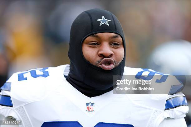 Jeremy Mincey of the Dallas Cowboys looks across the field during warm-ups prior to the 2015 NFC Divisional Playoff game against the Green Bay...