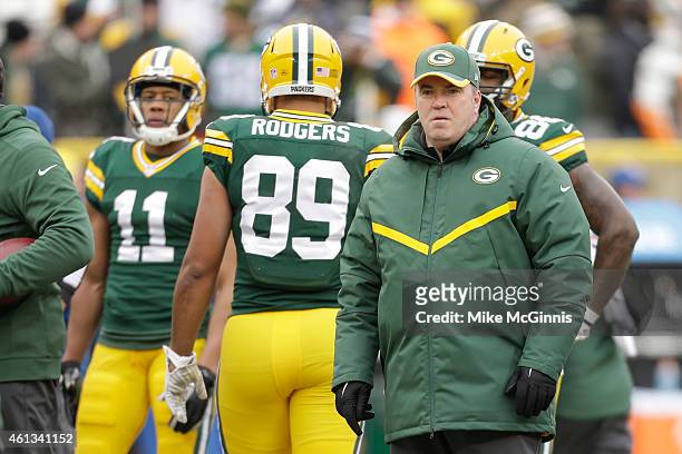 Head coach of the Green Bay Packers, Mike McCarthy, watches warm-ups prior to the 2015 NFC Divisional Playoff game against the Dallas Cowboys at...