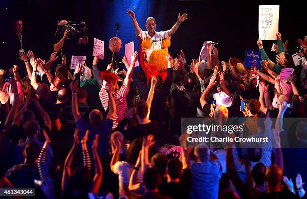 Martin Adams of England makes his entrance during the mens final match against Scott Mitchell of England during the BDO Lakeside World Professional...