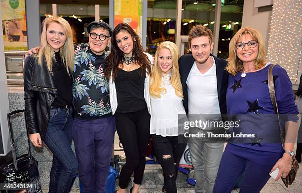 Sara Kulka, Rolf Scheider, Tanja Tischewitsch, Angelina Heger, Joern Schloenvoigt and Maren Gilzer pose before the flight to Australia as...