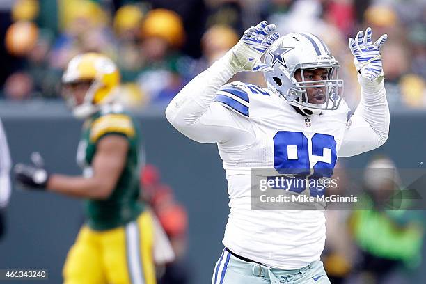 Jeremy Mincey of the Dallas Cowboys reacts after sacking quarterback Aaron Rodgers of the Green Bay Packers during the 2015 NFC Divisional Playoff...