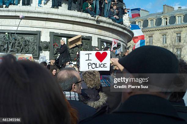 Demonstrators make their way along Place de la Republique during a mass unity rally following the recent terrorist attacks on January 11, 2015 in...