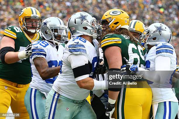 Nick Hayden of the Dallas Cowboys confronts David Bakhtiari of the Green Bay Packers during the 2015 NFC Divisional Playoff game at Lambeau Field on...