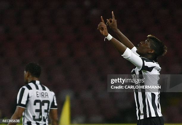 Juventus' French midfielder Paul Pogba celebrates after scoring during the Italian Serie A football match SSC Napoli vs Juventus FC on January 11,...