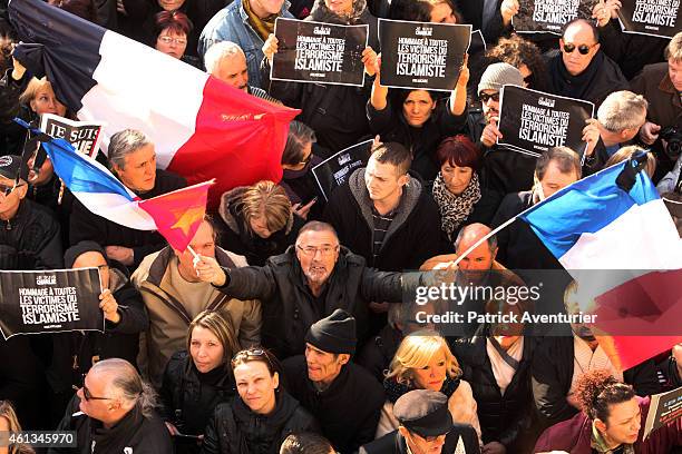 French Front National party president Marine Le Pen takes part in a Unity rally "Marche Republicaine" on January 11, 2015 in Beaucaire, France. The...