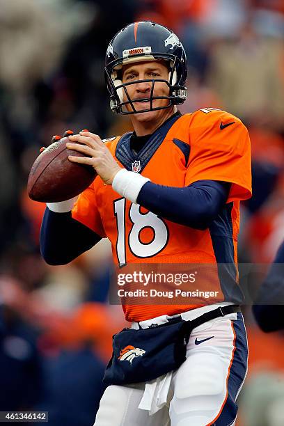 Peyton Manning of the Denver Broncos warms up prior to a 2015 AFC Divisional Playoff game against the Indianapolis Colts at Sports Authority Field at...