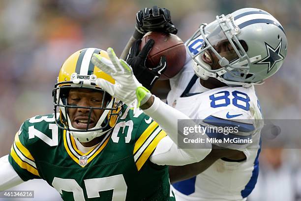 Dez Bryant of the Dallas Cowboys attempts a catch over Sam Shields of the Green Bay Packers during the 2015 NFC Divisional Playoff game at Lambeau...