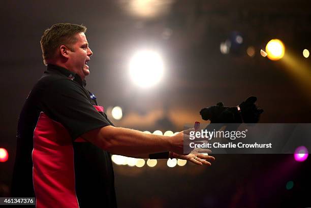 Scott Mitchell of England celebrates winning the mens final against Martin Adams of England during the BDO Lakeside World Professional Darts...