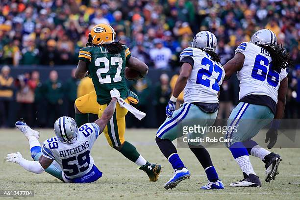 Eddie Lacy of the Green Bay Packers carries the football against the Dallas Cowboys during the 2015 NFC Divisional Playoff game at Lambeau Field on...