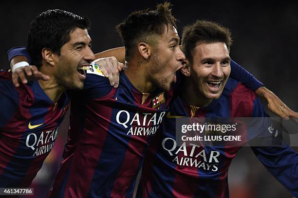 Barcelona's Argentinian forward Lionel Messi, Barcelona's Brazilian forward Neymar da Silva Santos Junior and Barcelona's Uruguayan forward Luis...