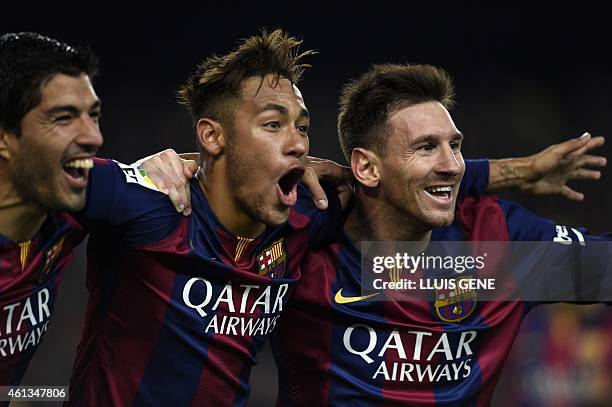 Barcelona's Argentinian forward Lionel Messi, Barcelona's Brazilian forward Neymar da Silva Santos Junior and Barcelona's Uruguayan forward Luis...