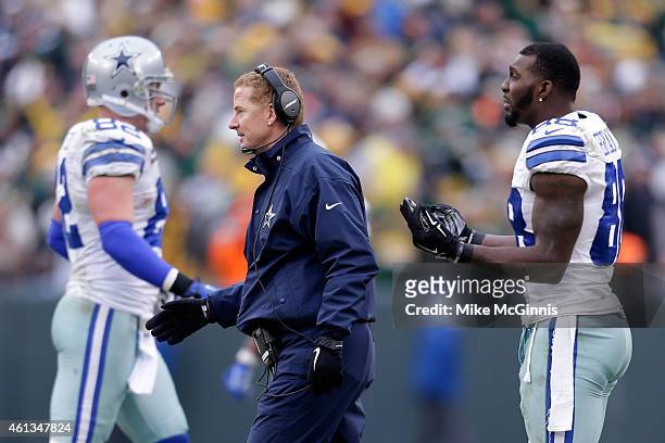 Dez Bryant of the Dallas Cowboys waits for a replay on a call late in the fourth quarter against the Green Bay Packers during the 2015 NFC Divisional...