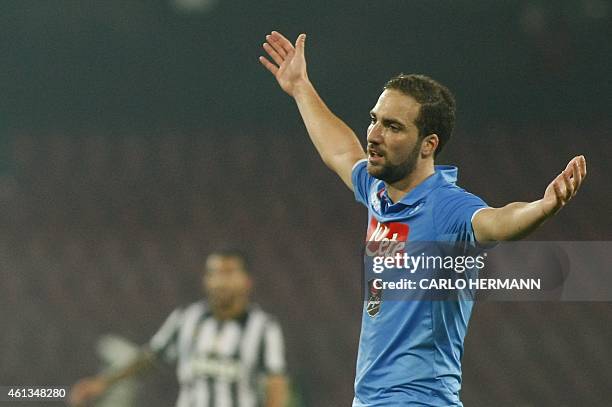 Napoli's Argentinian forward Gonzalo Higuain reacts during the Italian Serie A football match SSC Napoli vs Juventus FC on January 11, 2015 at the...