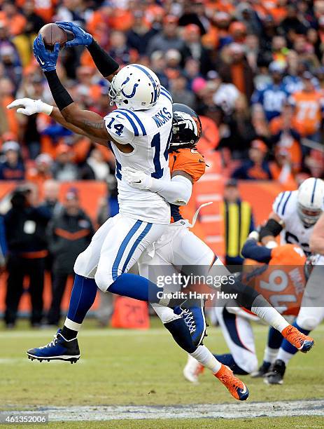 Hakeem Nicks of the Indianapolis Colts makes a catch against the Denver Broncos during a 2015 AFC Divisional Playoff game at Sports Authority Field...