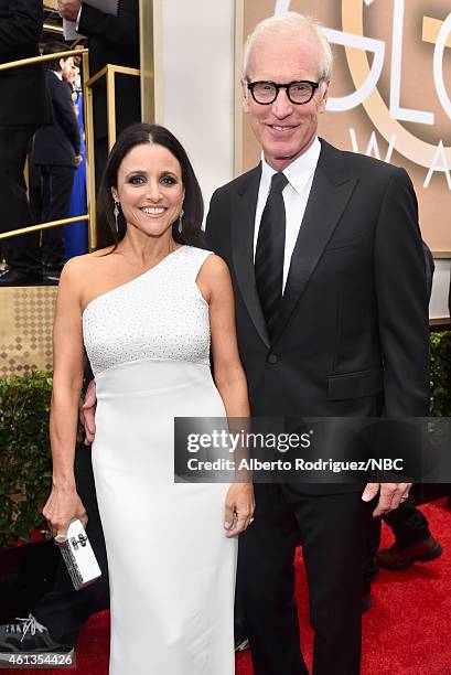 72nd ANNUAL GOLDEN GLOBE AWARDS -- Pictured: Actress Julia Louis-Dreyfus and writer Brad Hall arrive to the 72nd Annual Golden Globe Awards held at...