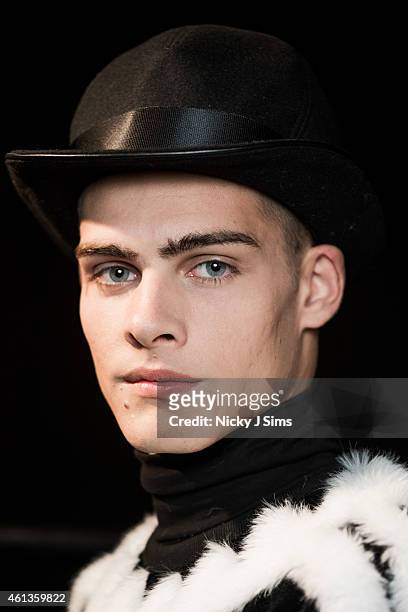 Model is seen backstage prior to the KTZ show on day 3 of London Collections: Men Autumn Winter 2015 at The Old Sorting Office on January 10, 2015 in...