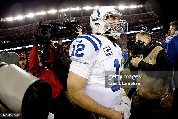 Andrew Luck of the Indianapolis Colts leaves the field after defeating the Denver Broncos 24-13 in a 2015 AFC Divisional Playoff game at Sports...