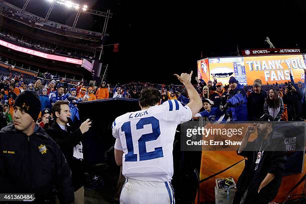 Andrew Luck of the Indianapolis Colts leaves the field after defeating the Denver Broncos 24-13 in a 2015 AFC Divisional Playoff game at Sports...