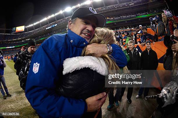 Head coach Chuck Pagano of the Indianapolis Colts receives an embrace after a 24-13 win over the Denver Broncos after a 2015 AFC Divisional Playoff...