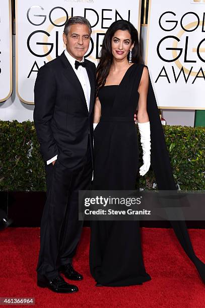 Actor George Clooney and attorney Amal Alamuddin Clooney attend the 72nd Annual Golden Globe Awards at The Beverly Hilton Hotel on January 11, 2015...