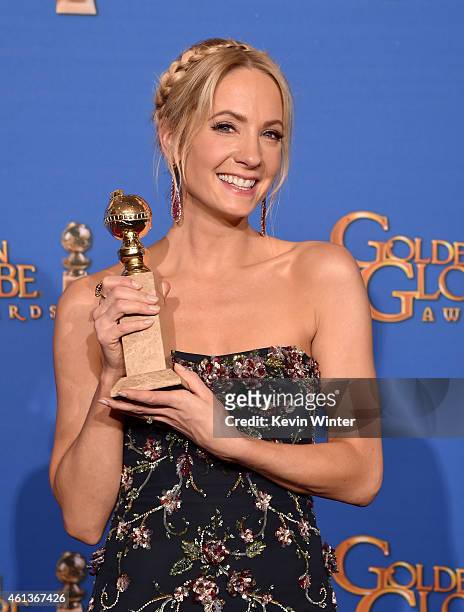 Actress Joanne Froggatt, winner of Best Supporting Actress in a Series, Miniseries, or Television Film for 'Downton Abbey,' poses in the press room...