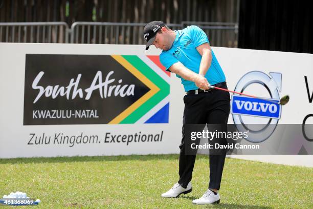 Branden Grace of South Africa conducts a Junior Clinic on the driving range during the pro-am as a preview for the 2014 Volvo Golf Champions...