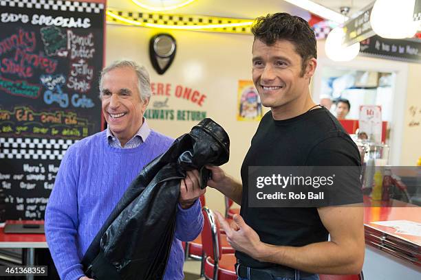 Henry Winkler and Ben Freeman attend a photocall for new musical "Happy Days" at Ed's Easy Diner on January 8, 2014 in London, England.