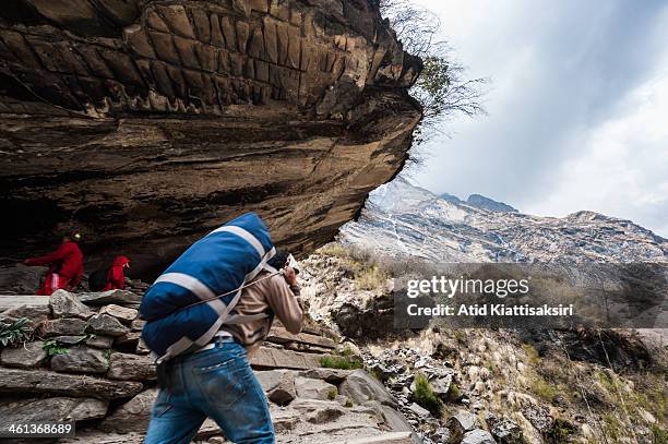 Porter carries a trekker's bag in the Annapurna conservation area.