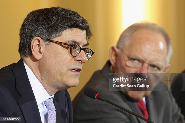 German Finance Minister Wolfgang Schaeuble and U.S. Treasury Secretary Jack Lew speak to the media following talks at the Finance Ministry on January...