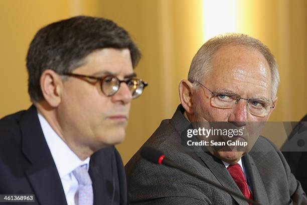 German Finance Minister Wolfgang Schaeuble and U.S. Treasury Secretary Jack Lew speak to the media following talks at the Finance Ministry on January...