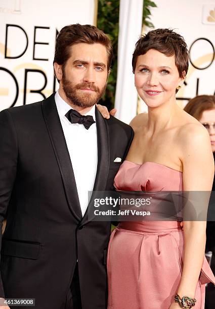 Actors Jake Gyllenhaal and Maggie Gyllenhaal attend the 72nd Annual Golden Globe Awards at The Beverly Hilton Hotel on January 11, 2015 in Beverly...