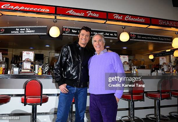 Henry Winkler and Ben Freeman attend a photocall for "Happy Days - A New Musical" at Ed's Easy Diner on January 8, 2014 in London, England.