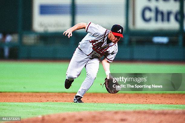 Marcus Giles of the Atlanta Braves fields during Game Two of the National League Division Series against the Houston Astros on October 10, 2001 at...