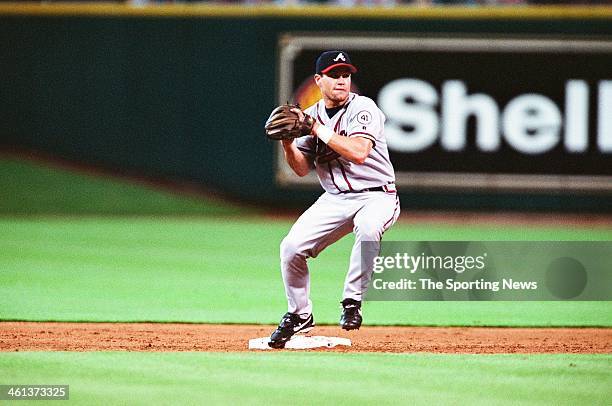 Marcus Giles of the Atlanta Braves fields during Game Two of the National League Division Series against the Houston Astros on October 10, 2001 at...