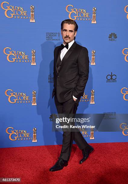 Actor Colin Farrell poses in the press room during the 72nd Annual Golden Globe Awards at The Beverly Hilton Hotel on January 11, 2015 in Beverly...