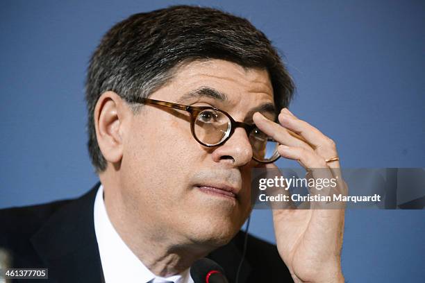 Treasury Secretary Jack Lew speaks to the media with German Finance Minister Wolfgang Schaeuble following talks at the Finance Ministry on January 8,...