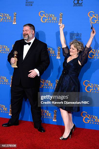72nd ANNUAL GOLDEN GLOBE AWARDS -- Pictured: Writer/director Dean DeBlois and producer Bonnie Arnold, winners of Best Animated Feature Film for 'How...
