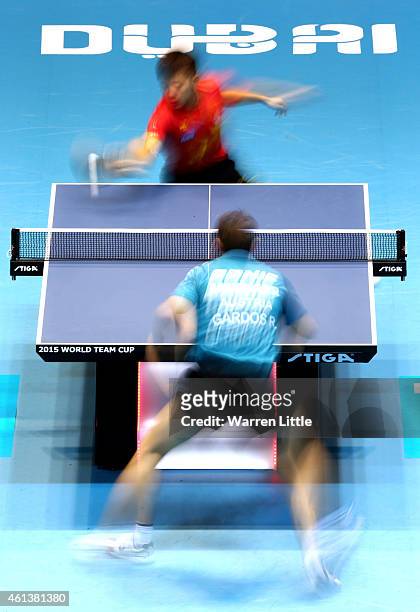 Zhang Jike of China in action against Robert Gardos of Austria during the Men's Final of the 2015 ITTF World Team Cup at Al Nasr Sports Stadium on...