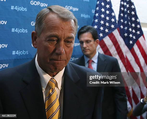 House Speaker John Boehner and House Majority Leader Eric Cantor , walk away after speaking to the media after attending the weekly House Republican...