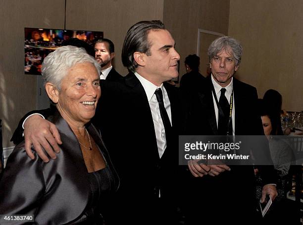 Actor Joaquin Phoenix with mother Arlyn Phoenix and publicist Ken Sunshine attend the 72nd Annual Golden Globe Awards cocktail party at The Beverly...