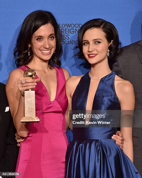 Writer/producer Sarah Treem and actress Julia Goldani Telles, winners of the Best Drama Series Award for "The Affair" pose in the press room during...