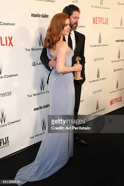 Actress Amy Adams and Darren Le Gallo attend The Weinstein Company & Netflix's 2015 Golden Globes After Party presented by FIJI Water, Lexus, Laura...